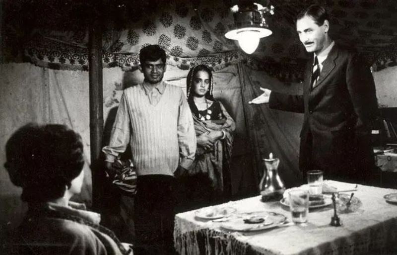 A picture from 'Massey Sahib' (1985), featuring Raghubir Yadav as Francis Massey (left), Arundhati Roy as Saila (centre), and Barry John as Adam Charles (right)