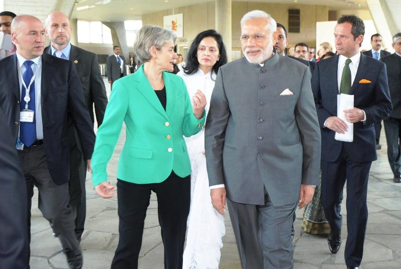 A picture of Ruchira Kamboj assisting Prime Minister Narendra Modi on his visit to UNESCO Headquarters Paris in 2015