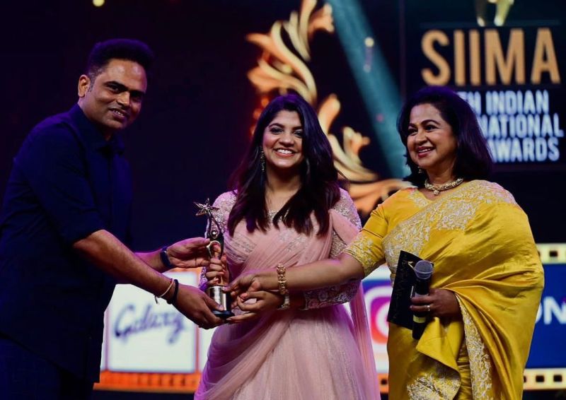 Aparna Balamurali receiving SIIMA Award