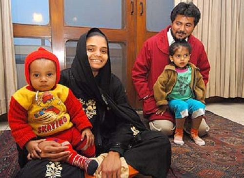 Bilkis Bano with her husband and daughters