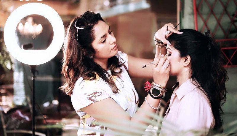 Chaitra Hallikeri working as a makeup artist