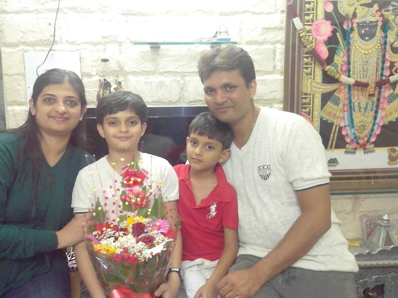 Childhood picture of Namit with his family - (from left) Pragna Shah, Namit Shah, Sujal Shah, and Nikhil Shah