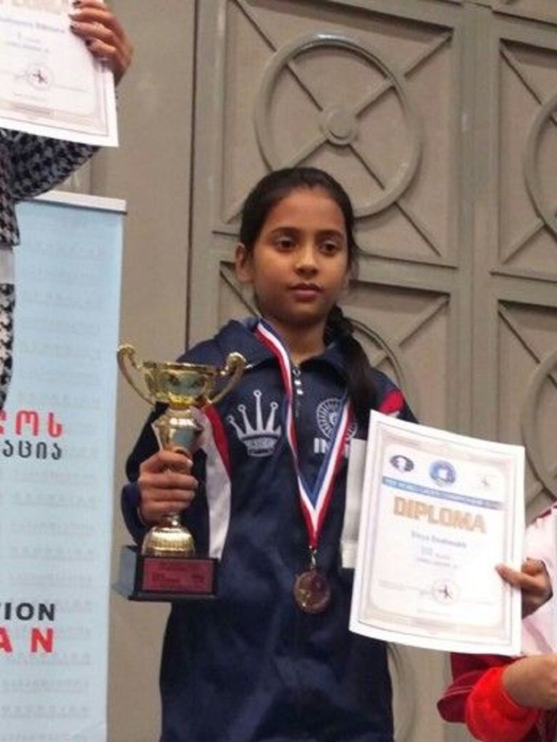 Divya Deshmukh with her World Youth Championship 2016 trophy