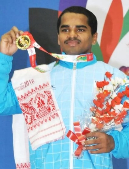 Gururaj Poojary after winning a gold medal in 2016
