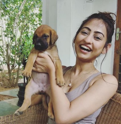 Kiran Yogeshwar with her pet dog