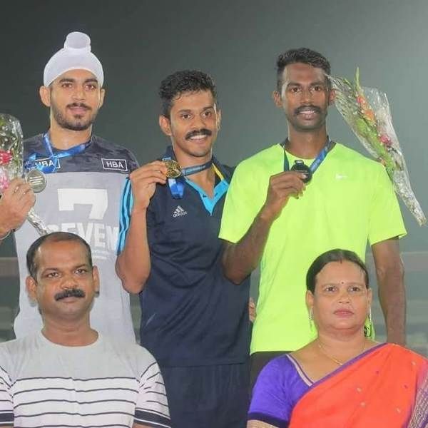 Noah Nirmal Tom posing with his gold medal at Service Athletic Championship 2018, Karnataka
