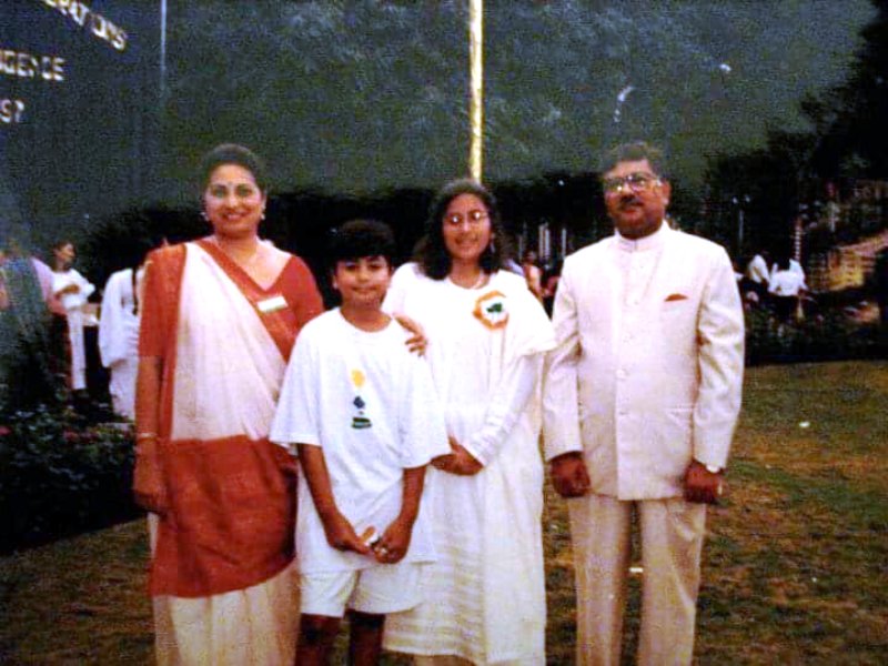 A photograph of Radhika Gupta with her family