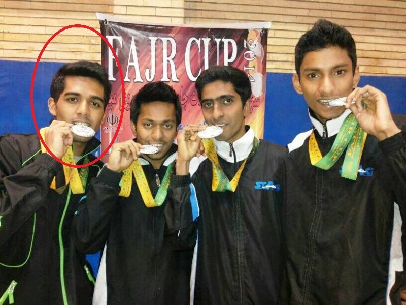 Sanil Shetty, along with his team, showing their silver medals at the 2014 Fajr Cup