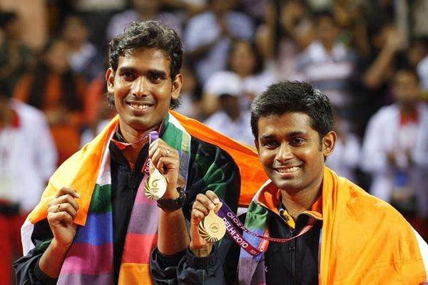 Sharath Kamal and Subhajit Saha after winning the gold medal in the 2010 Commonwealth Games
