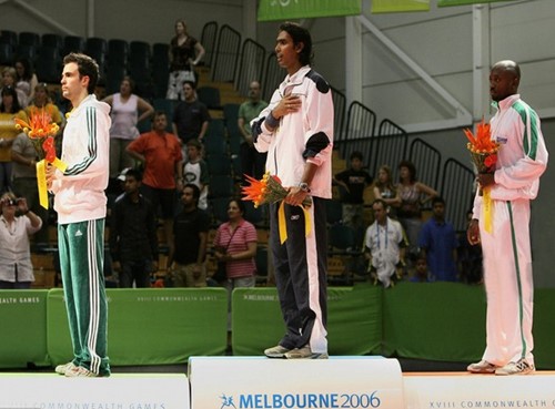 Sharath Kamal (middle) after winning a gold medal in the 2006 Commonwealth Games