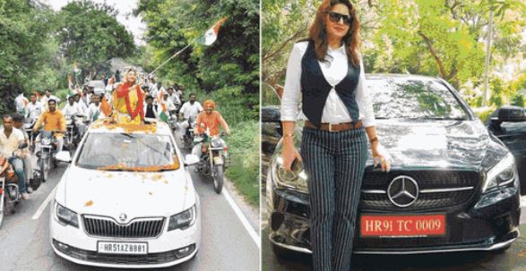 Sonali Phogat posing with the luxury rides that Sudhir Sangwan arranged for her