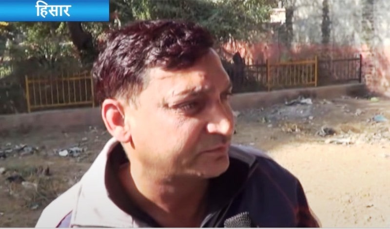 Surendra Phogat while giving an interview to a news channel