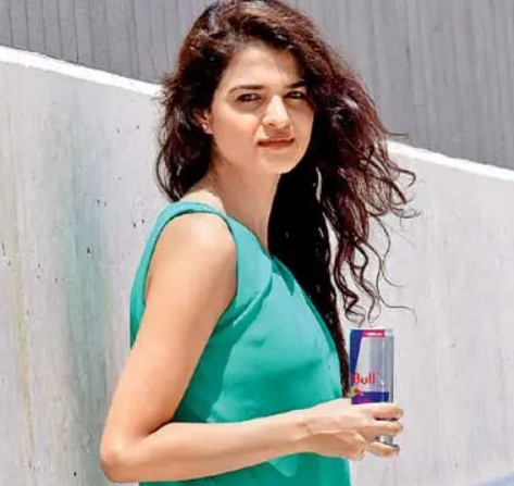 Tania Sachdev with a can of Red Bull
