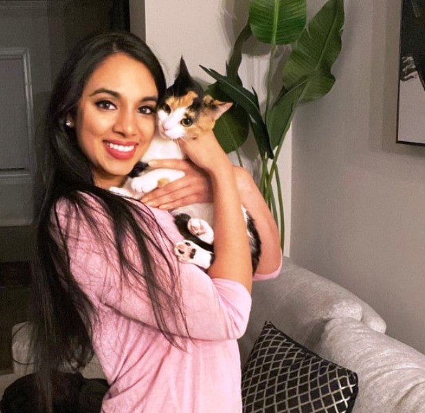 Viral Joshi holding her pet cat named Xena