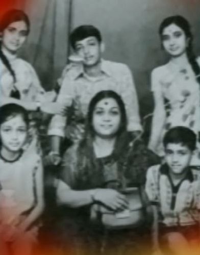 A childhood picture of Govinda (sitting in the right corner) with his mother and siblings