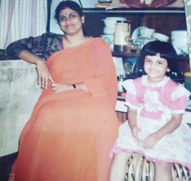 A childhood picture of Megha Chakraborty with her mother