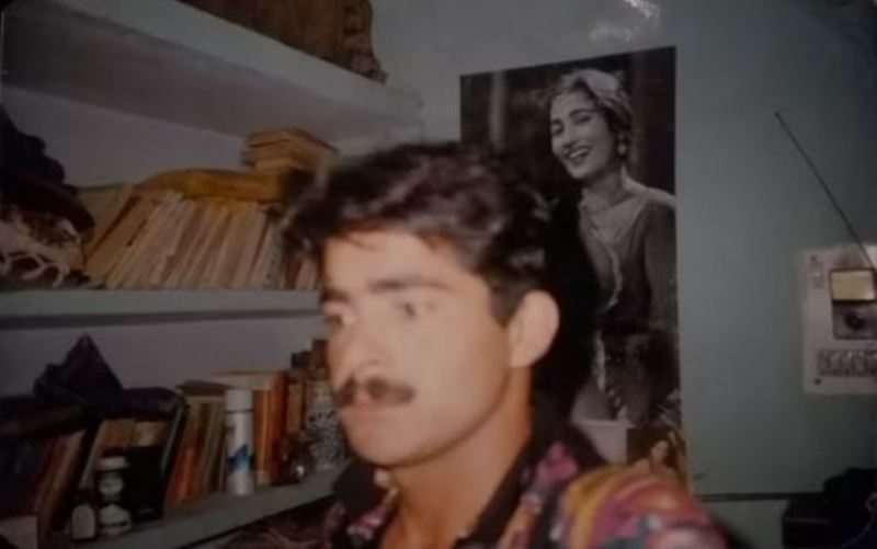 A poster of actress Madhubala on the wall in the background of Afzal Guru