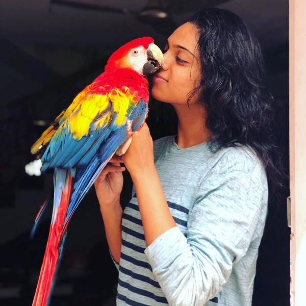 Abhinayashree with her pet bird Harley