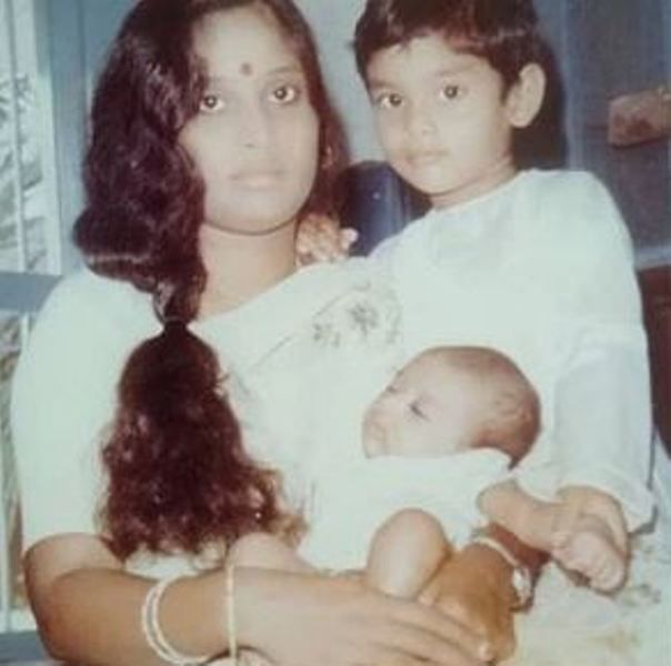 An infant picture of Baladitya along with his mother and elder brother