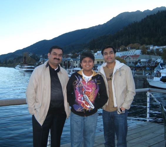 An old picture of Karan Adani with his father and brother