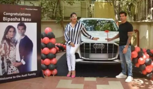 Bipasha Basu and Karan Singh Grover with their Audi Q7 car