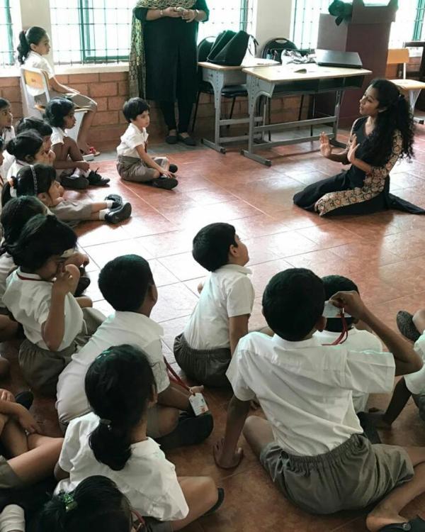 Darshana Rajendran narrating tales to students from Global Public School in 2017