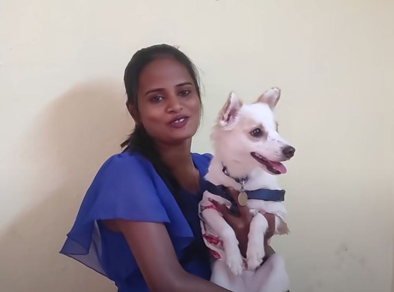 Faima Shiek with her dog, Lucky