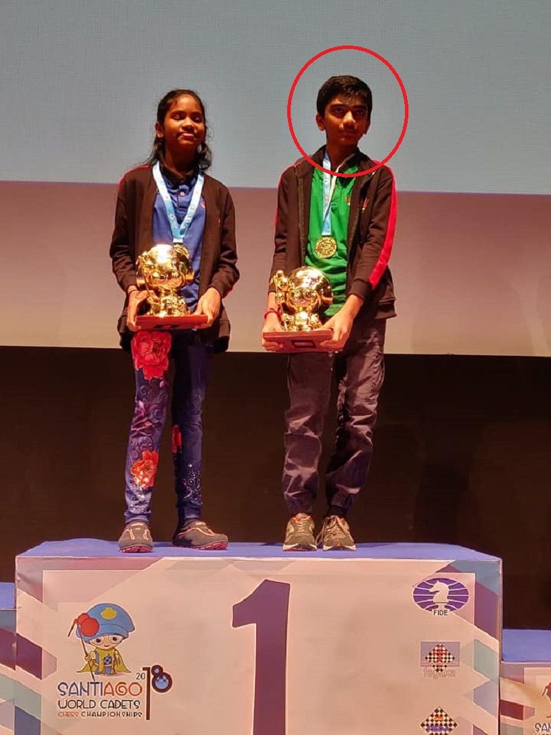 Gukesh D posing after winning World Youth Chess Championships 2018