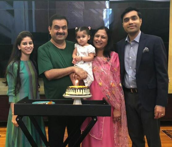 Karan Adani with his parents, wife, and daughter