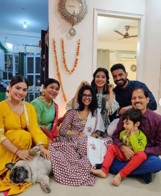 Krishna Mukherjee with her family