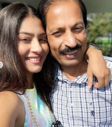 Krishna Mukherjee with her father