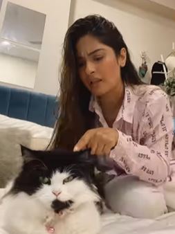 Krishna Mukherjee with her pet cat