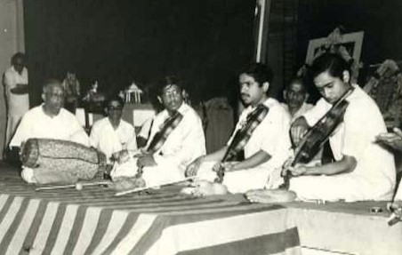 The trio brothers L Vaidyanathan, L Subramaniam, and L Shankar with Palghat Mani Iyer on Mridangam during a music show in 1990