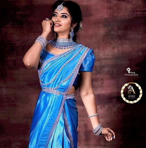 Mahalakshmi while promoting a clothing brand on social media