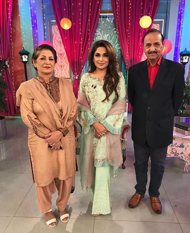 Meera with her parents