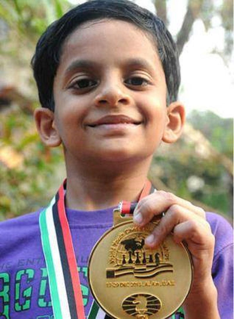 Nihal Sarin posing with gold medal after winning World Blitz Under-10 Championship 2013