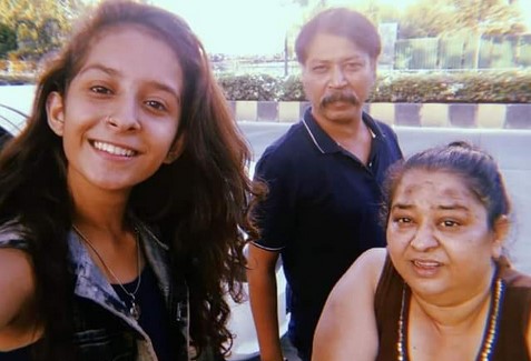 Nishi Singh Bhadli with her husband and daughter in 2019