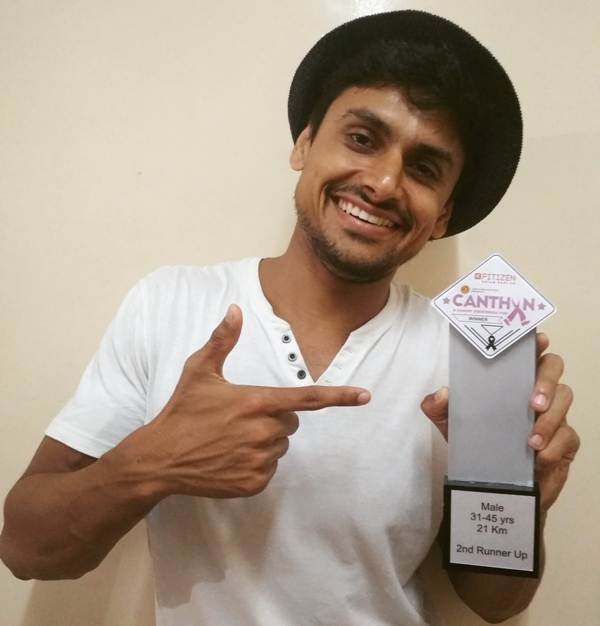 Nupur Shikhare posing with his trophy that he won at Canthon (2019)