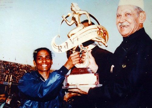 P. T. Usha with her Asian Championship 1989 trophy