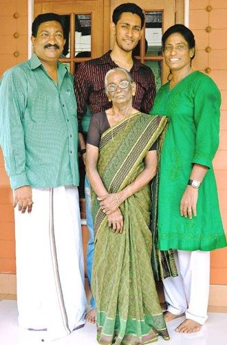 P. T. Usha with her mother, husband, and son