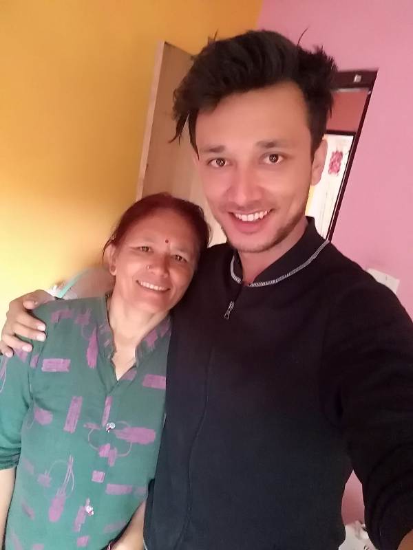 Puskar Karki with his mother