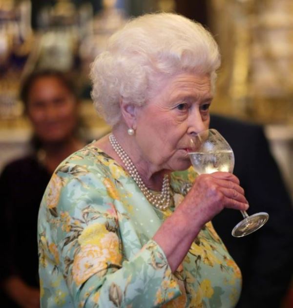 Queen Elizabeth having a cocktail drink