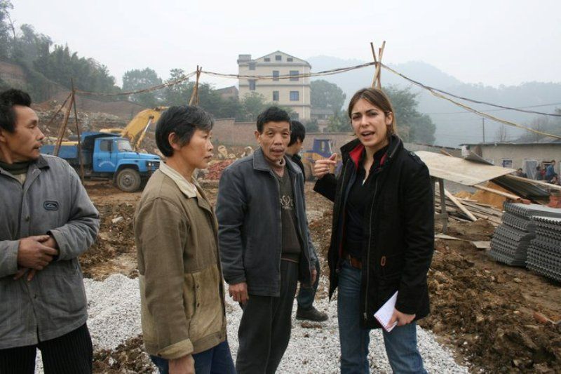 Ramita Navai with locals at Chongqing, China - reporting from the land which was used to be used their farmland