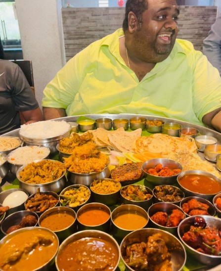 Ravindar Chandrasekaran while eating South Indian food