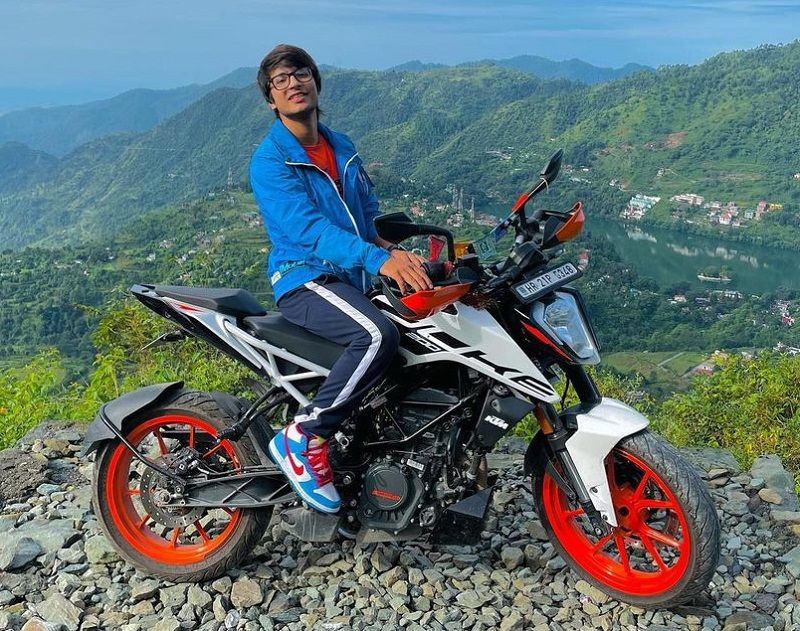 Sourav Joshi posing on his KTM