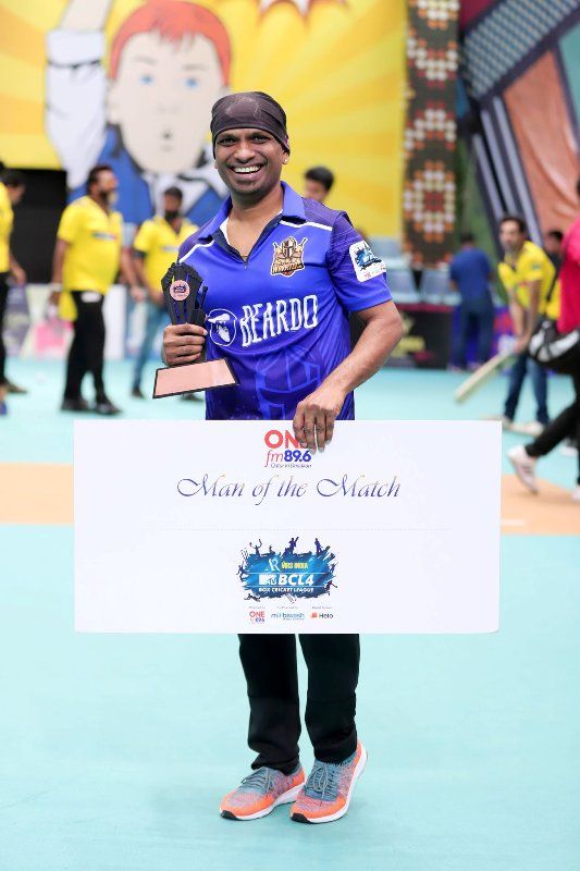 Srikant Maski with his award of Man of the Match at Box Cricket League season 4