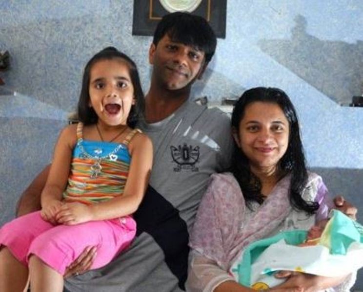 Tanmay Vekaria with his wife, Mitsu Vekaria, and children