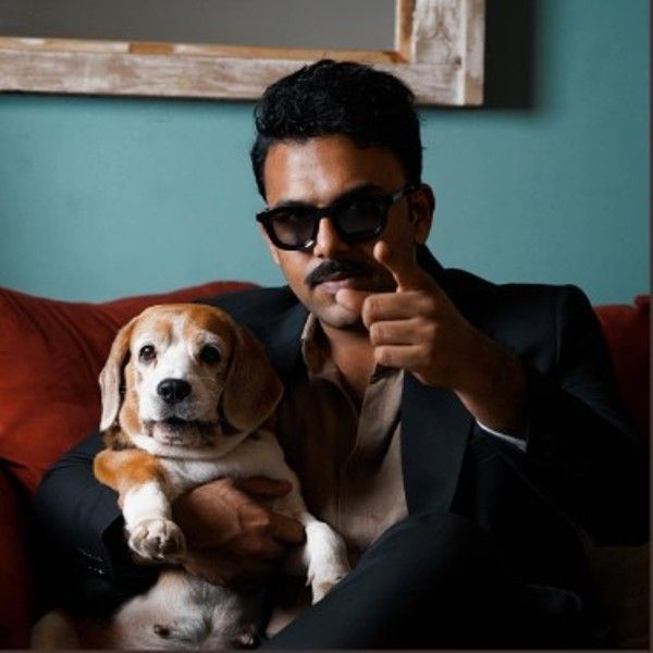 Tharun Bhascker with his pet dog Coffee