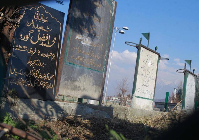 The tombstone of Afzal Guru placed adjacent to Maqbool Bhat's (the founder of JKLF) in the Martyrs’ Graveyard in Srinagar