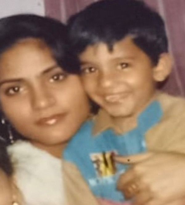 A childhood picture of Amit Thakur with his mother